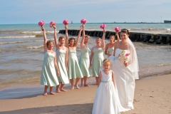 Bride-Bridesmaids-Beach-Flowers
