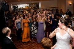 Bride-Throwing-Bouquet-Reception