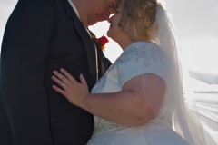 Groom-Bride-Outdoors-Sunlight