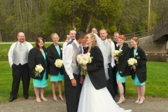 Groom-Bride-Wedding-Party-Kissing-Outdoors