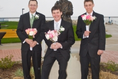 Groom-Groomsmen-Holding-Flowers