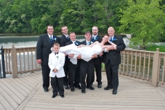 Groomsmen-Holding-Bride