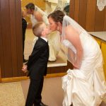 Katie & CJs Sheboygan Wedding - Bride kissing son