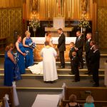 Katie & CJs Sheboygan Wedding - Weddin party at the alter